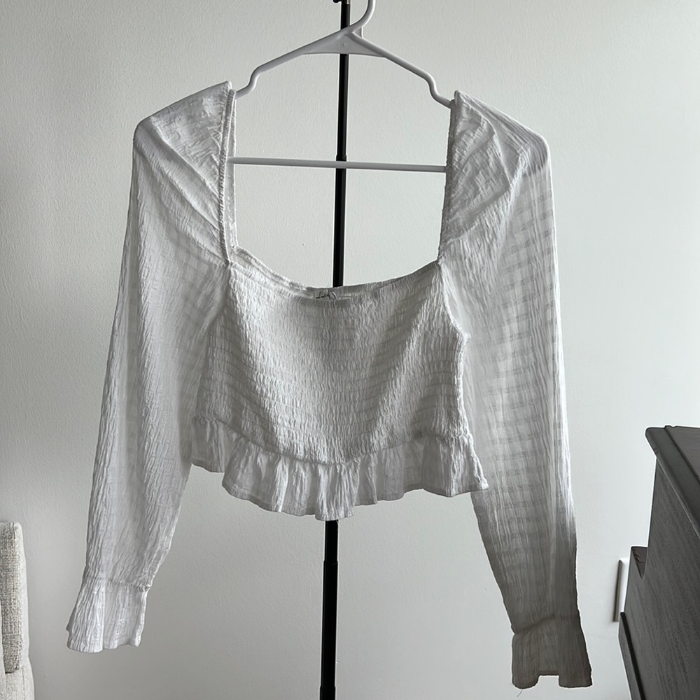 White mid crop top.